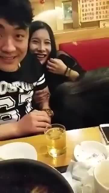 ladyboy get sucked by a friend in a restaurant