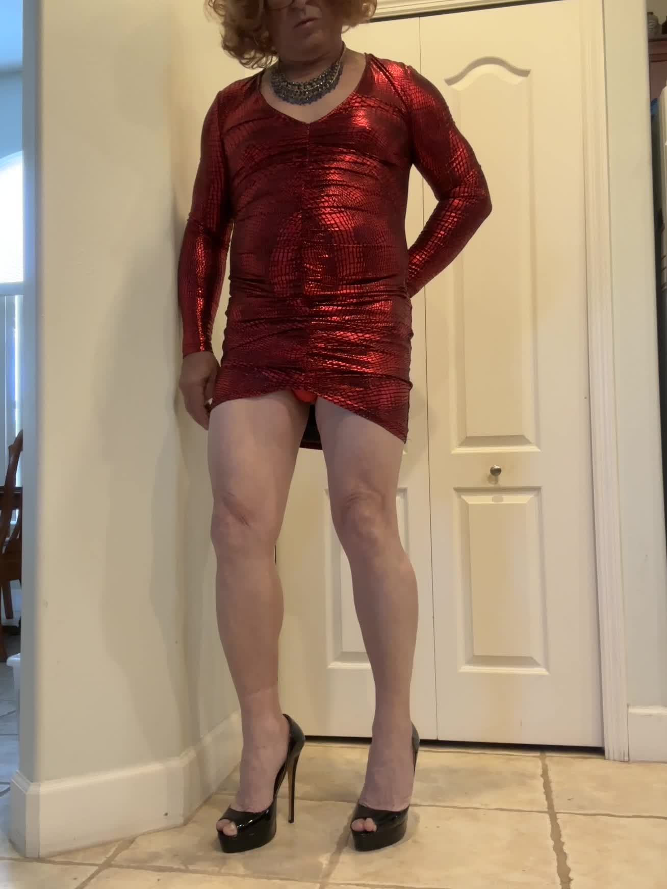 Me in a sexy red dress posing