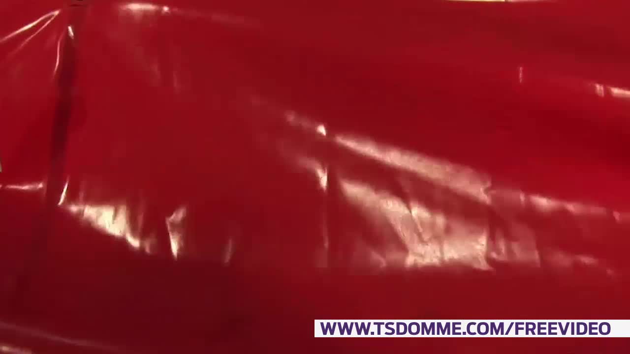 Blonde tranny in latex outfit strips and jerks off till cumshot on thigh